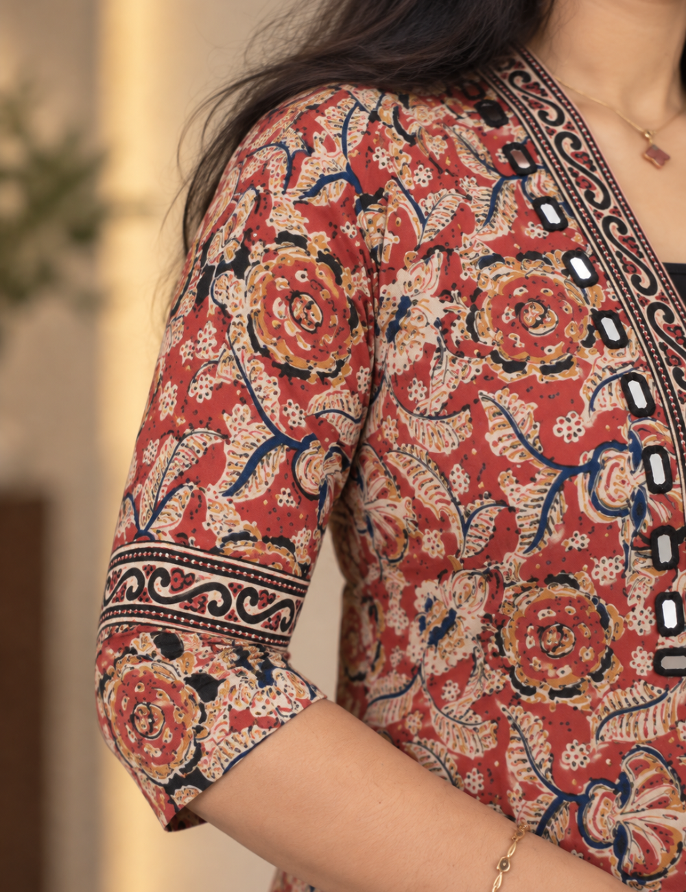 Red kalamkari kurti with mirror work