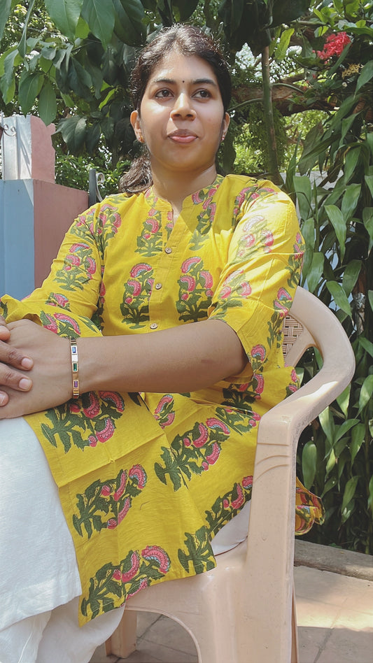 Yellow wth Green orint kurti
